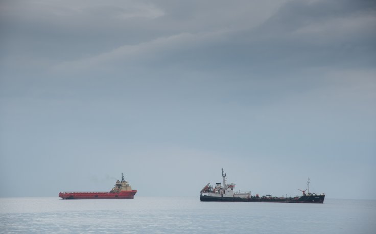 industrial-cargo-ships-anchored-in-the-ocean-2025-10-11-14-40-16-utc